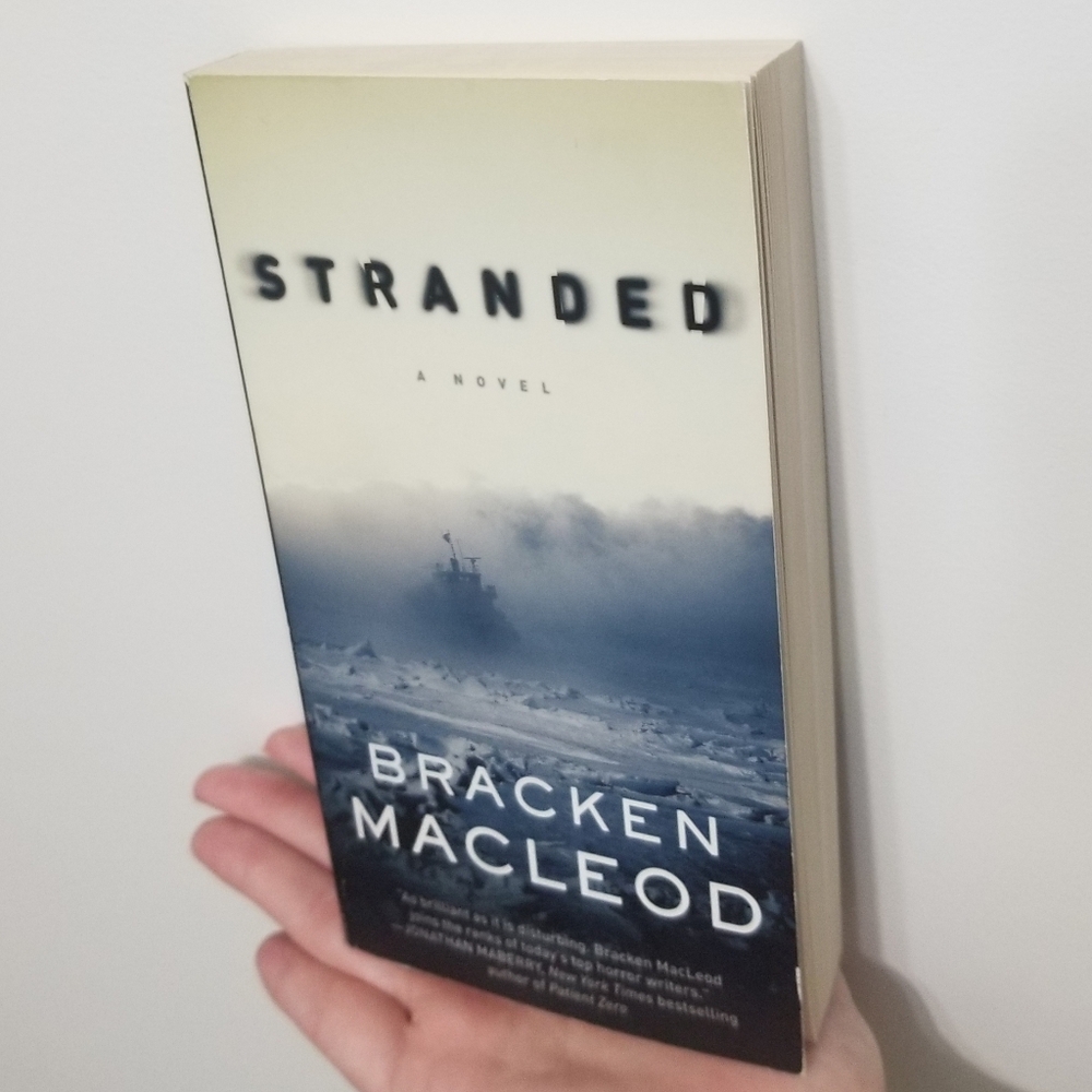 for fans of Thing From Another World: "Stranded" paperback, EUC